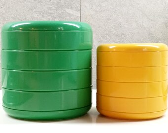 Yellow Multiplor Rexite container designed by Rino Pirovano in the 1980s, small version