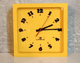 Lorenz yellow wall clock from the 1970s