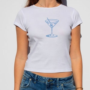 Martini Baby Tee | Women&#39;s Graphic T-Shirt | Classic Baby Tee Fit | Fitted Martini Graphic Tee