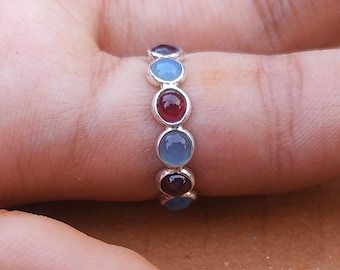 Handmade Sterling Silver Garnet Eternity Ring: Aquamarine Accent