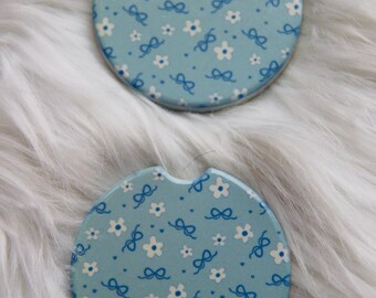 Podkładki samochodowe Blue Bow: chłonne ceramiczne, modne akcesorium samochodowe