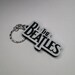 The Beatles Keychain Live In Concert 1962 Poster New Official Size