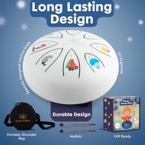 May include: White handpan with a colorful design, including a rainbow, a dragon, and a fish. The handpan is engraved with the musical notes and the words "Sounds of Silence". It comes with two mallets and a black carrying bag. The handpan is also gift-ready, with a box featuring a child playing the handpan.