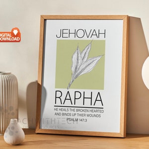 Può includere: Un download digitale stampabile di una stampa incorniciata con uno sfondo verde e un'illustrazione in bianco e nero di una foglia. Il testo "Jehovah Rapha" è in nero con la frase "Egli guarisce i cuori spezzati e benda le loro ferite Salmo 147:3" sotto.