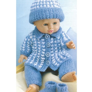May include: A knitted baby doll outfit in blue and white with a matching hat. The outfit includes a cardigan, pants, and booties.