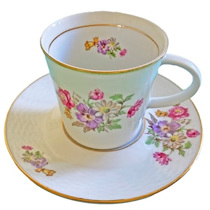Delicate Czechoslovakia Teacup and Saucer with Integrated Weave and Floral Bouquet Design From the 1950s