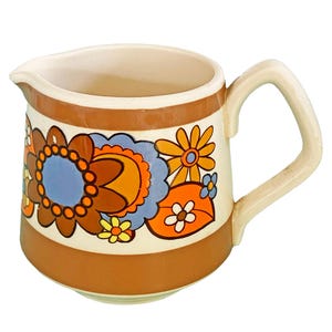 Sadlerkan met Flower Power-ontwerp uit de jaren 60/70. Zeer goede staat.
