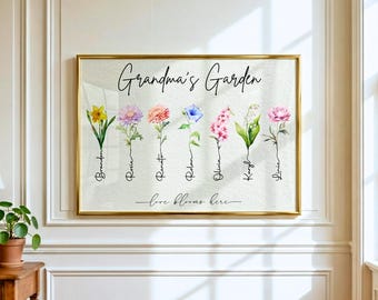 May include: A horizontal framed wall art print featuring the text "Grandma's Garden" at the top and "love blooms here" at the bottom. Seven watercolour-style flowers are illustrated in a row, each with a name written in black script on its stem.