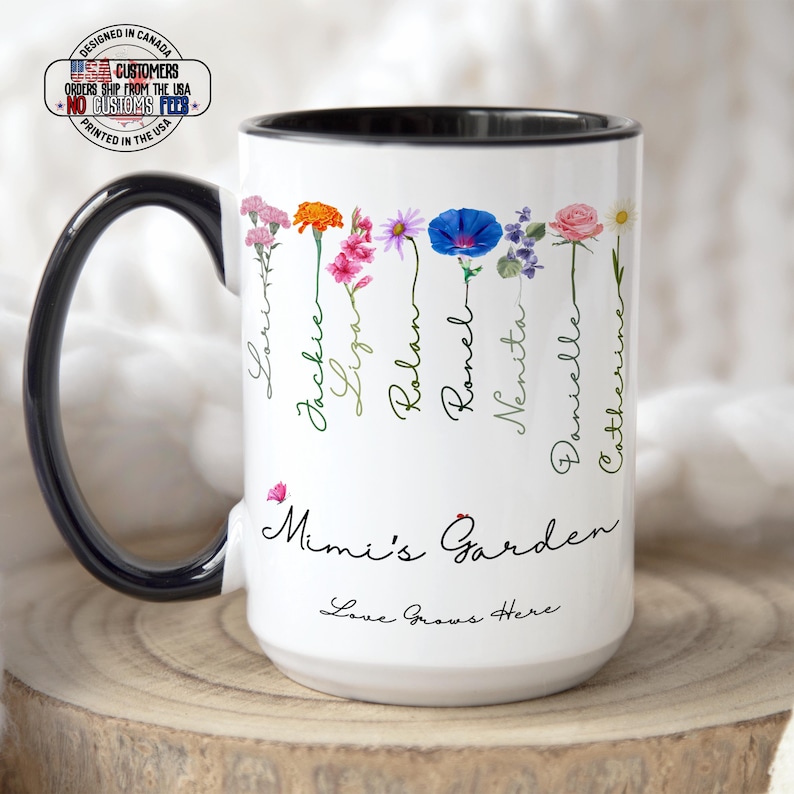 A white Coffee Cup with Black Accents, includes Kids Names and Flowers, This "Mimi's Garden" mug features six illustrated blooms labeled Danielle, Brandon, Jackie, Rachelle, Lori, Renato. Below reads "Love Grows Here"—a perfect Personalized Birth Flower Gift or Christmas Present for Mom and Mimi.