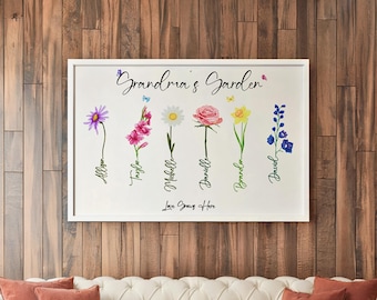 May include: A white framed wall art print featuring the text Grandma's Garden at the top and Love Grows Here at the bottom. Six watercolour-style flowers are illustrated in a row, each with a name written in cursive script along its stem.