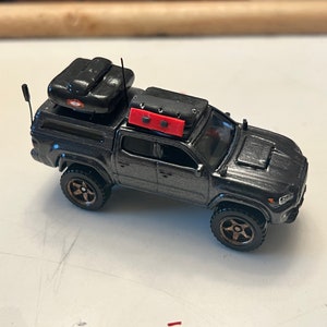 1/64 Toyota Tacoma hand detailed custom replica of a customers overlander
