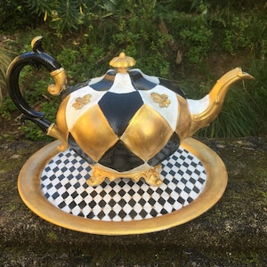 Large antique decorative Alice metal teapot and matching tray