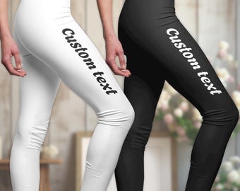 May include: Two pairs of leggings, one white and one black, with the text "Custom text" printed on the side.