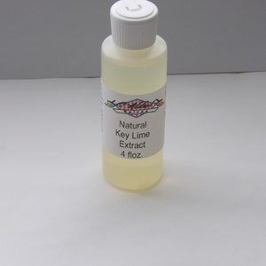 May include: A clear glass bottle with a white cap containing 4 fluid ounces of natural key lime extract. The bottle has a white label with the text "Natural Key Lime Extract 4 fl.oz."