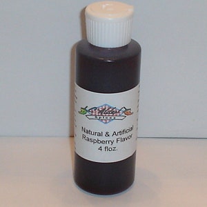 May include: A 4-ounce bottle of natural and artificial raspberry flavouring. The bottle is dark brown with a white label that reads "Natural & Artificial Raspberry Flavour 4 fl.oz."