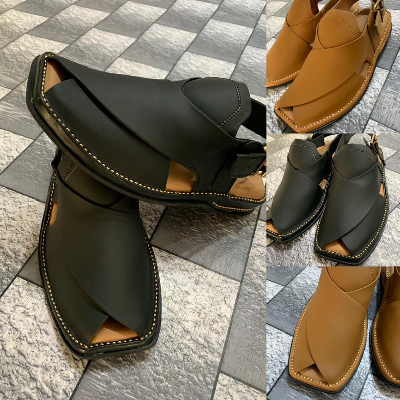 May include: Two pairs of leather sandals with a criss-cross design. One pair is black and the other is brown.
