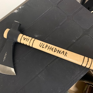 Throwing tomahawks. Mountain man, Viking style. Hand made and engraved.