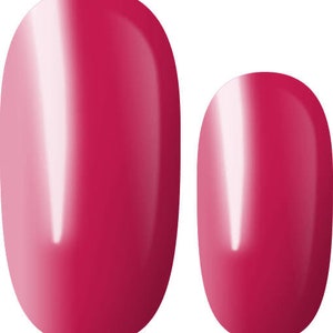 May include: Two oval-shaped nail polish samples in a bright pink color.