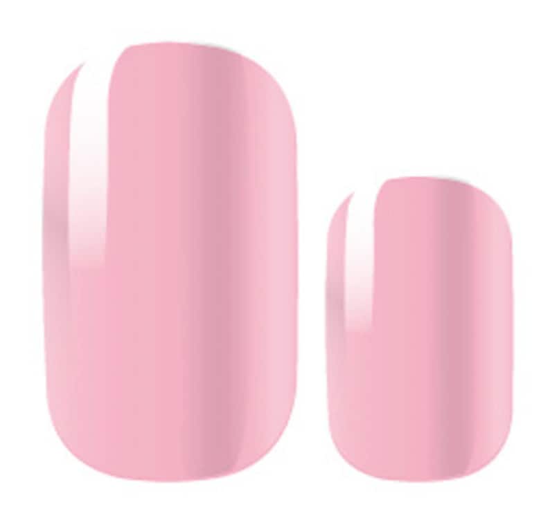 May include: Two pink oval-shaped press-on nails with a glossy finish.