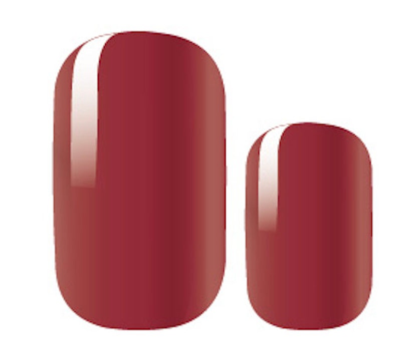 May include: Two red nail polish wraps, one larger and one smaller, with a glossy finish.