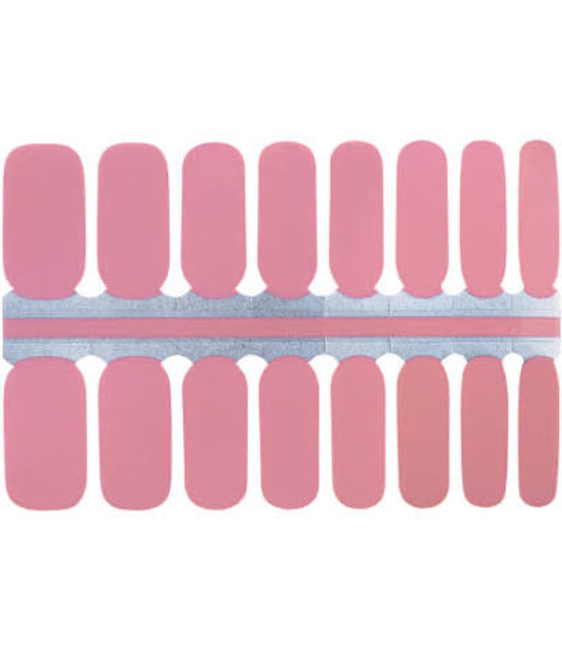 May include: A set of 20 pink nail wraps for a simple and elegant manicure.