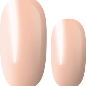 May include: Two oval-shaped false nails in a light peach color. The nails are smooth and glossy.