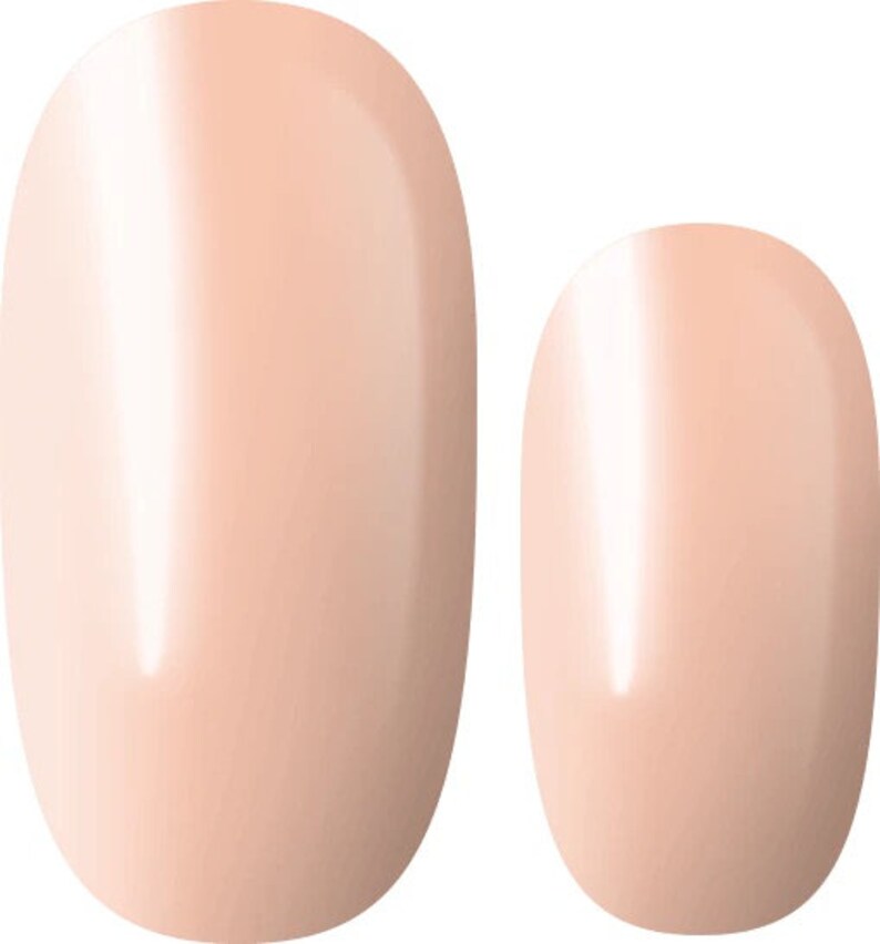 May include: Two oval-shaped false nails in a light peach color. The nails are smooth and glossy.