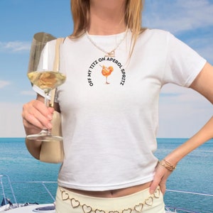 Aperol Spritz y2k baby tee shirt Cocktails logo baby t shirts Italian summer drink graphic shirt Off my titz on Aperol Spritz t shirt funny