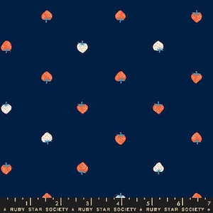 May include: Dark navy fabric with a repeating pattern of strawberries. The strawberries are in shades of red, white, and orange, with green stems. The fabric has a playful, summery feel. The text "RUBY STAR SOCIETY" is at the bottom.