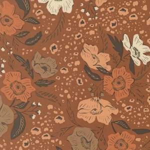 May include: A fabric pattern featuring a terracotta background with a repeating design of stylized flowers in shades of cream, light orange, and dark brown. The floral motifs are interspersed with small, irregular dark brown spots.
