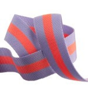 May include: Purple elastic with two wide orange stripes. This elastic is great for sewing projects.