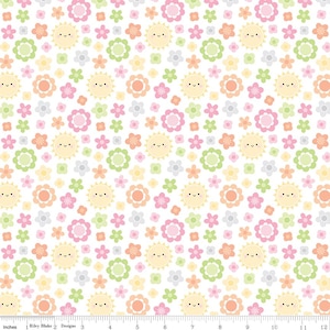 May include: A white background with a repeating pattern of yellow suns with smiling faces and pink, green, and orange flowers.