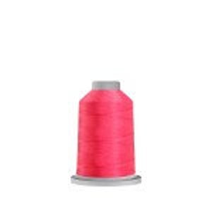 May include: A spool of bright pink thread.