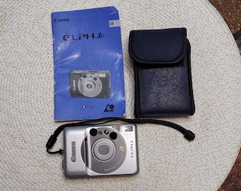 Vintage 1990s Canon ELPH Jr. Camera with Booklet and Case