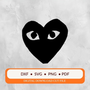 Puede incluir: Un corazón negro con ojos blancos sobre un fondo gris. La imagen incluye un rectángulo naranja con el texto "DXF • SVG • PNG • PDF" y "DIGITAL DOWNLOAD CUT FILE".