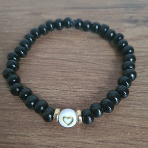 Black beaded bracelet with initial of your choice