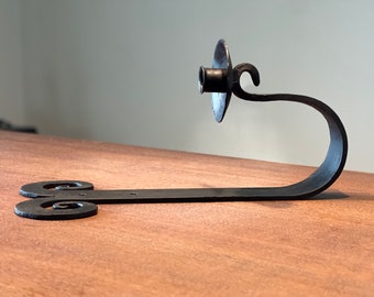 Applique da parete in ferro battuto forgiato a mano per una candela