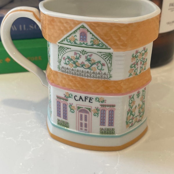 Lenox Spice Village Coffee Cafe Mug Orange with original packaging.