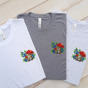Amanita Mushroom Embroidered Tee - Whimsical Red Fungi Design, Unique Nature-Inspired T-Shirt, Ideal Gift for Mushroom Enthusiasts!