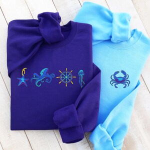 Broderad havströja: Sjöstjärna, sjöhäst, bläckfiskdesign