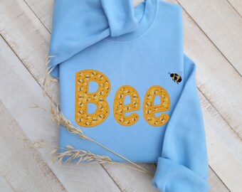 Felpa con ape ricamata: pullover unisex con applicazione