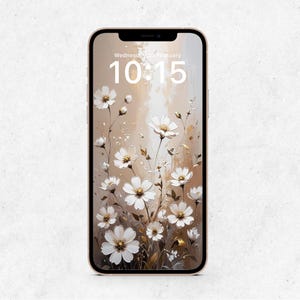 May include: A smartphone displays a floral wallpaper featuring white daisy-like flowers with yellow centers against a beige and gold background. The time, 10:15, and the date, Wednesday, February, are visible at the top.