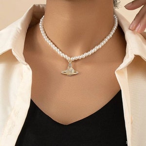 Vivienne Westwood Get A Life Pendant Necklace - Jewellery from  Brother2Brother UK