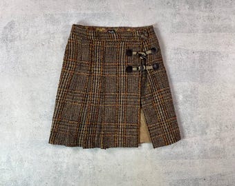Minifalda plisada de tweed vintage de Dolce&Gabbana (archivo) / Mujer (26 x 40)