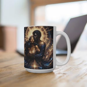May include: White ceramic mug with a colorful image of a couple embracing. The image features a man and woman with dark skin tones, surrounded by a swirling galaxy of stars and light.