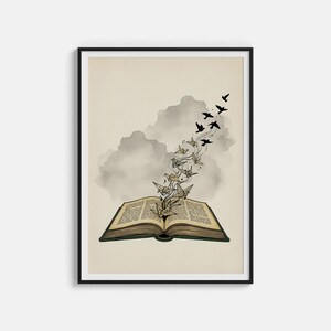 Peut inclure: Impression d'art encadrée représentant un livre ouvert avec des oiseaux en origami et des oiseaux noirs s'envolant. Le fond est beige clair avec un motif de nuage gris. Le livre a du texte détaillé.