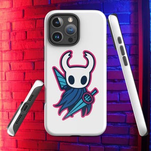 May include: White phone case with a cartoon character design. The character has a white head, blue cape, and a blue and pink sword. The case has a black border and is shown from different angles.