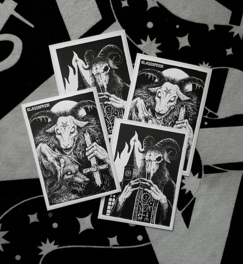 May include: Four black and white stickers featuring a goat-like demon with horns and a cross. The stickers have the text "GLASSOFEEZE" on them.