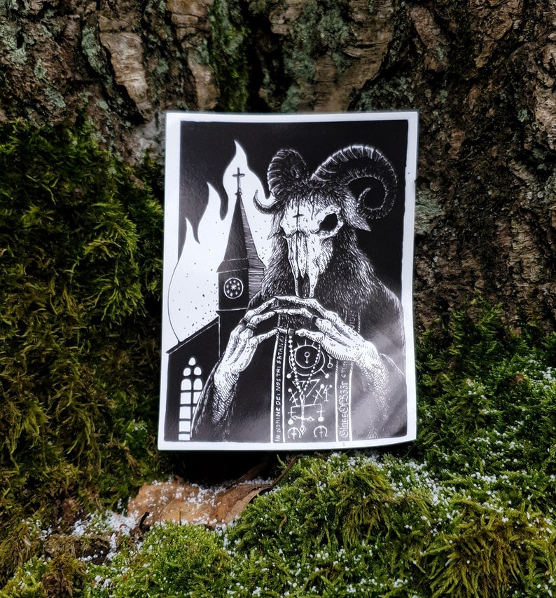May include: Black and white illustration of a goat-headed figure wearing a robe and holding a rosary. The figure is standing in front of a church with flames behind it. The image has the text "INFERNO DEI" and "CHIESA OSSESSA" on it.