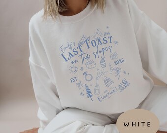 Custom Last Toast On The Slopes Bachelorette Crewneck Sweatshirts - Personalized Ski Bridal Party Gifts